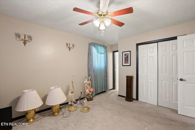 116 Oak St, Jacksboro, TN 37757 - bedroom with light carpet, a closet, and a ceiling fan
