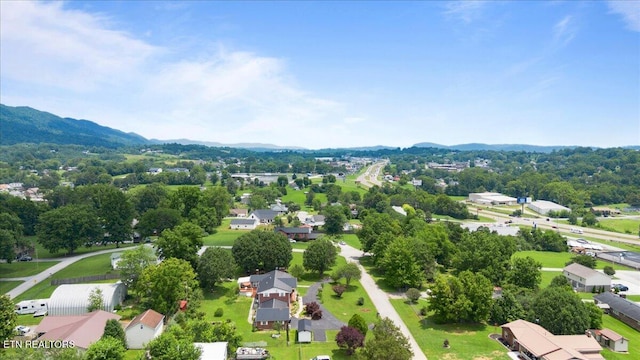 116 Oak St, Jacksboro, TN 37757 - aerial perspective of suburban area featuring a mountainous background