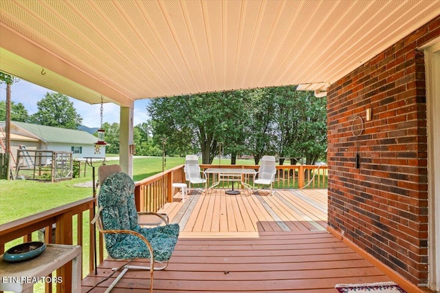 116 Oak St, Jacksboro, TN 37757 - wooden terrace featuring a yard and outdoor dining space