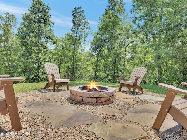 1940 Smoky Cove Rd, Sevierville, TN 37876 - view of patio / terrace featuring an outdoor fire pit