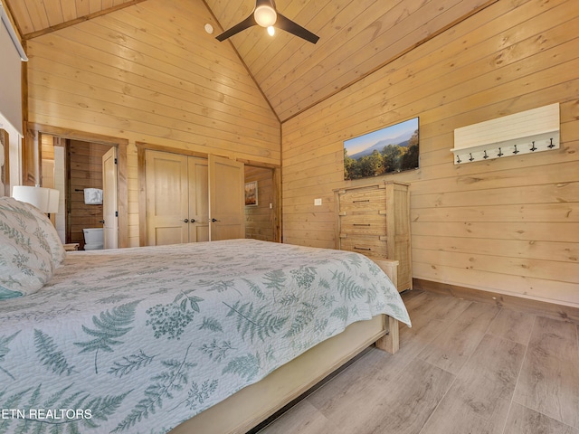 1940 Smoky Cove Rd, Sevierville, TN 37876 - bedroom featuring high vaulted ceiling, wood ceiling, wood walls, light wood-type flooring, and a ceiling fan