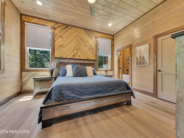 1940 Smoky Cove Rd, Sevierville, TN 37876 - bedroom with wooden walls, wooden ceiling, recessed lighting, wood finished floors, and ensuite bath