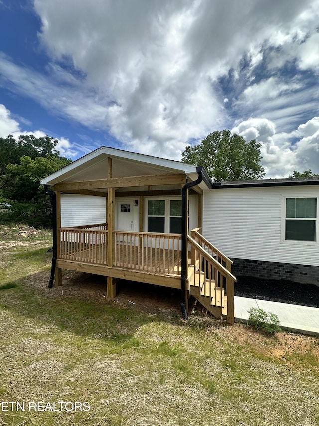 9556 Crisman Rd, Heiskell, TN 37754 - view of front of house featuring a wooden deck