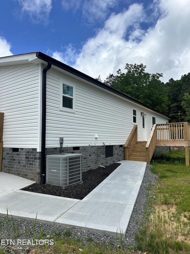 9556 Crisman Rd, Heiskell, TN 37754 - view of property exterior with crawl space and a deck