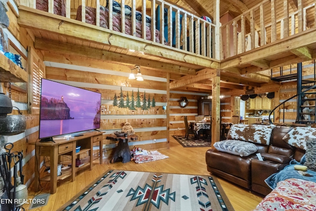 721 Leisure Way, Newport, TN 37821 - living area featuring wooden walls, wood finished floors, and beam ceiling