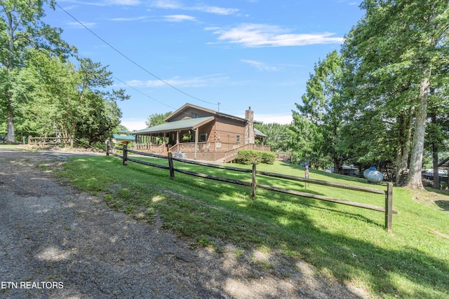 721 Leisure Way, Newport, TN 37821 - view of home's exterior with a chimney