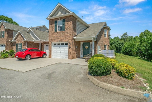 3701 Eliza Pointe Way, Knoxville, TN 37921 - traditional-style house featuring brick siding, driveway, and an attached garage