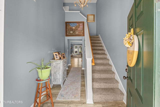 3701 Eliza Pointe Way, Knoxville, TN 37921 - staircase with wood finished floors and a chandelier