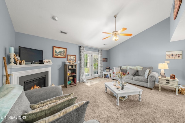3701 Eliza Pointe Way, Knoxville, TN 37921 - living room featuring lofted ceiling, a glass covered fireplace, carpet, and ceiling fan