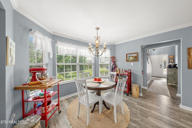 3701 Eliza Pointe Way, Knoxville, TN 37921 - dining space featuring a chandelier, wood finished floors, and ornamental molding