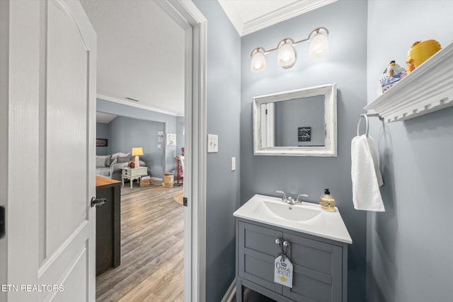3701 Eliza Pointe Way, Knoxville, TN 37921 - bathroom featuring crown molding, wood finished floors, and vanity