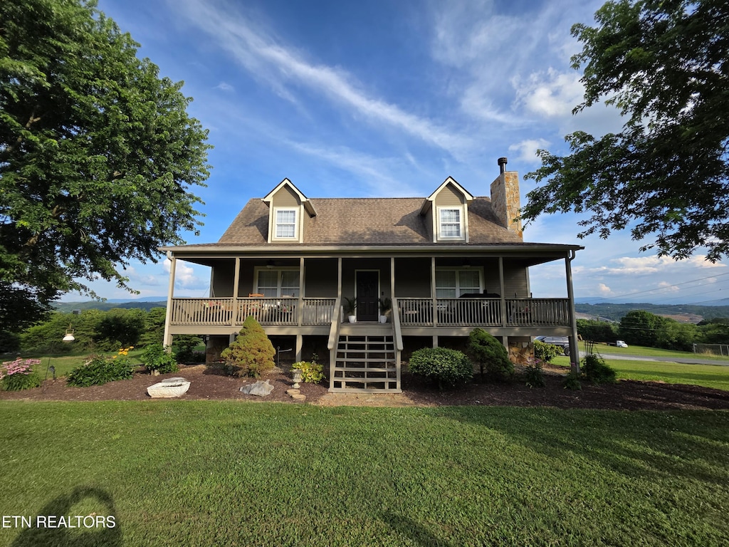 401 Klondike Cir, Kodak, TN 37764 - back of house featuring a chimney, a yard, a porch, and stairway
