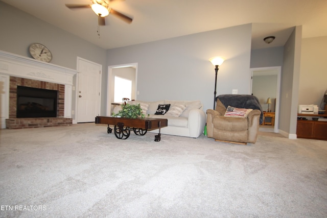 5843 Forest View Ln, Ooltewah, TN 37363 - living area featuring carpet floors, a ceiling fan, and a brick fireplace