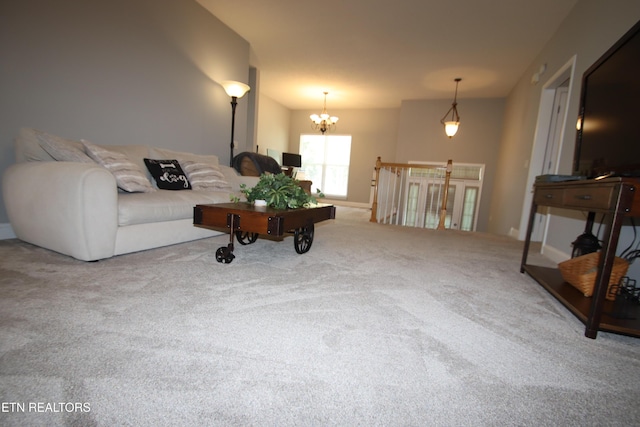 5843 Forest View Ln, Ooltewah, TN 37363 - living room with carpet floors and a chandelier