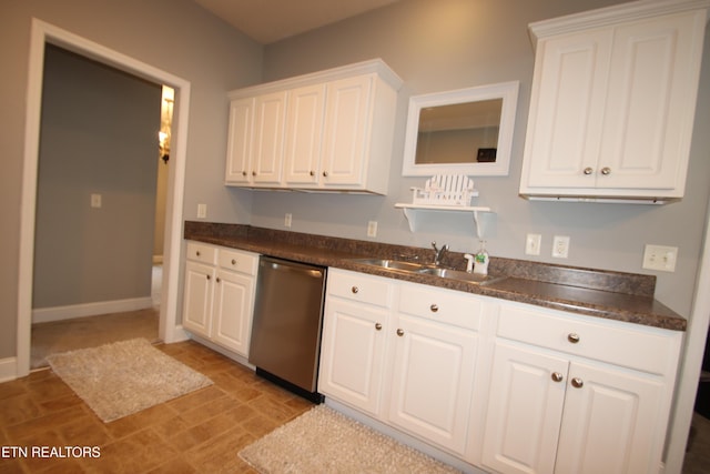 5843 Forest View Ln, Ooltewah, TN 37363 - kitchen featuring stainless steel dishwasher, white cabinets, and dark countertops