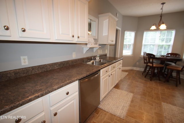 5843 Forest View Ln, Ooltewah, TN 37363 - kitchen with stainless steel dishwasher, a chandelier, white cabinets, and dark countertops