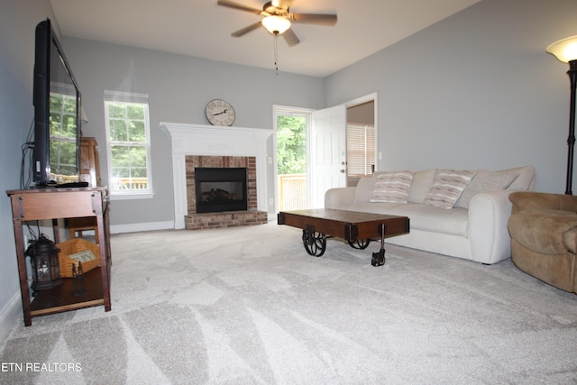 5843 Forest View Ln, Ooltewah, TN 37363 - carpeted living area featuring a ceiling fan, plenty of natural light, and a brick fireplace