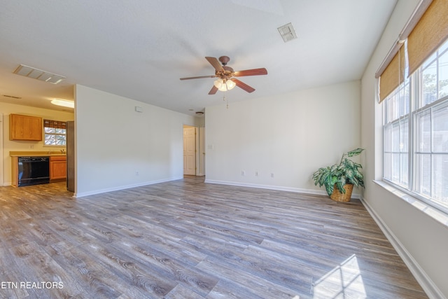 1709 Maple View Way Unit 4A, Knoxville, TN 37918 - unfurnished living room featuring wood finished floors and ceiling fan