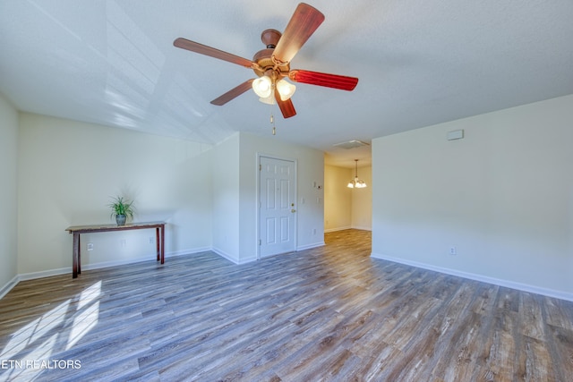 1709 Maple View Way Unit 4A, Knoxville, TN 37918 - unfurnished room with wood finished floors, a chandelier, and a ceiling fan