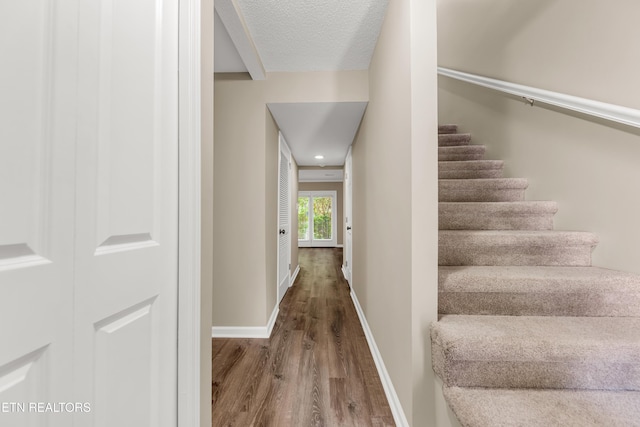 8707 Olde Colony Trl Unit 13, Knoxville, TN 37923 - stairway with wood finished floors and a textured ceiling