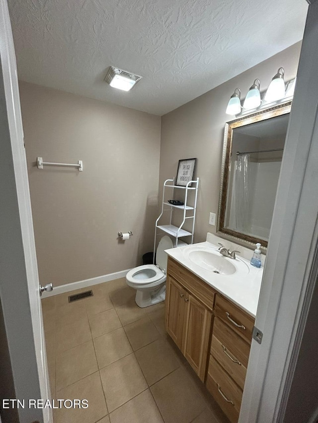 935 Pinetree Rd, Jamestown, TN 38556 - bathroom featuring tile patterned flooring, vanity, curtained shower, and a textured ceiling