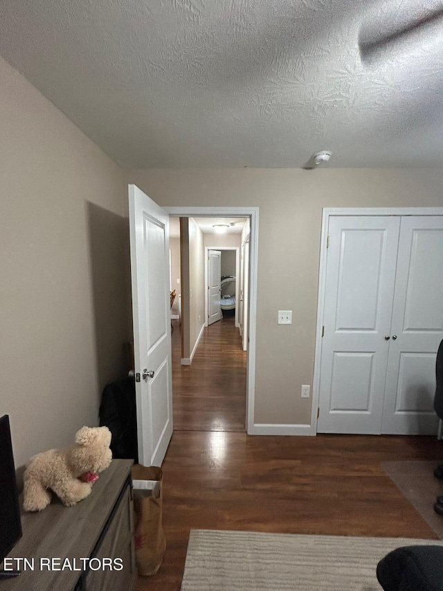 935 Pinetree Rd, Jamestown, TN 38556 - hall with wood finished floors and a textured ceiling
