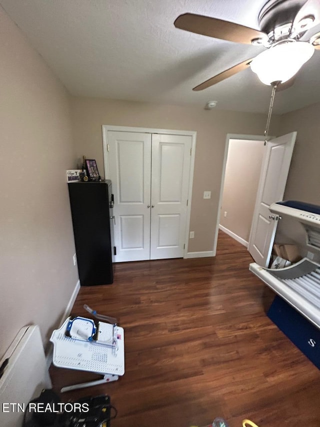 935 Pinetree Rd, Jamestown, TN 38556 - bedroom with wood finished floors, a closet, and a ceiling fan