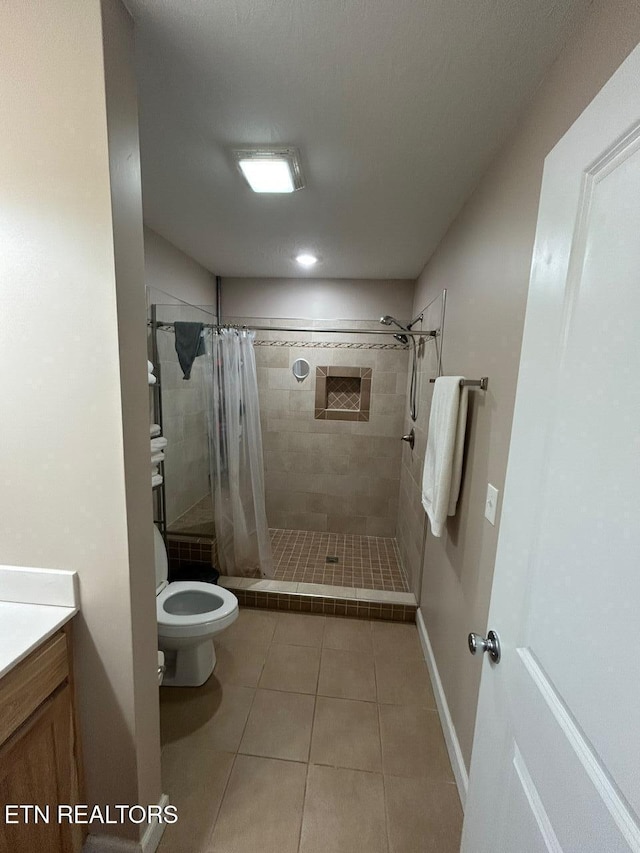 935 Pinetree Rd, Jamestown, TN 38556 - bathroom featuring tile patterned floors, a stall shower, and vanity