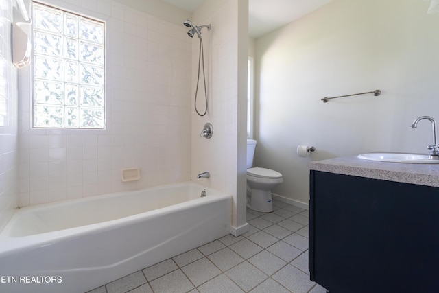 128 Orchard Ln, Oak Ridge, TN 37830 - bathroom with tile patterned flooring, vanity, tub / shower combination, and healthy amount of natural light