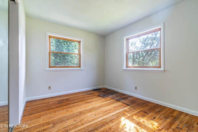 128 Orchard Ln, Oak Ridge, TN 37830 - empty room with plenty of natural light and wood-type flooring