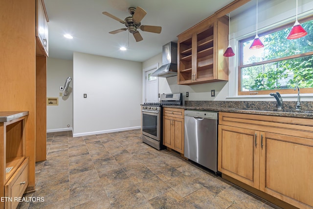 128 Orchard Ln, Oak Ridge, TN 37830 - kitchen featuring appliances with stainless steel finishes, wall chimney exhaust hood, a ceiling fan, dark stone finish floors, and recessed lighting