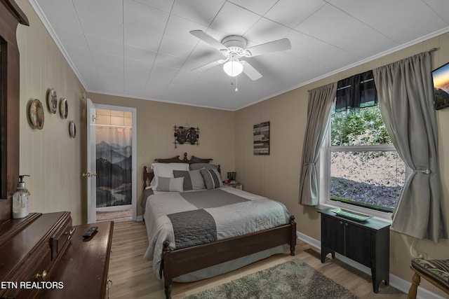 305 Shields View Dr, Gatlinburg, TN 37738 - bedroom featuring crown molding, wood finished floors, and ceiling fan