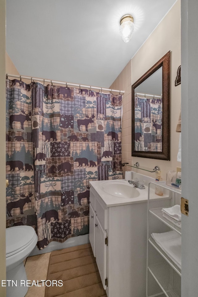 305 Shields View Dr, Gatlinburg, TN 37738 - bathroom featuring vanity, tile patterned flooring, and curtained shower