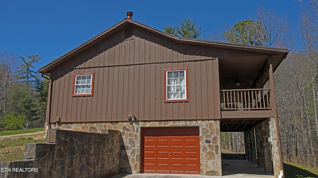 805 Punkton Rd, Del Rio, TN 37727 - view of side of property featuring stone siding and an attached garage