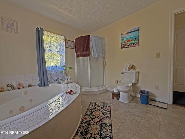 805 Punkton Rd, Del Rio, TN 37727 - bathroom with tile patterned flooring, a tub with jets, a shower stall, and a textured ceiling