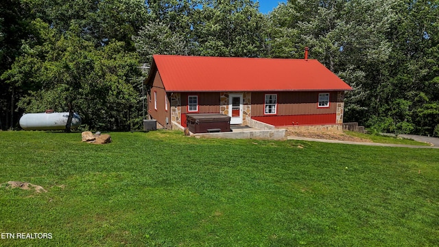 805 Punkton Rd, Del Rio, TN 37727 - view of front of home featuring a hot tub, a metal roof, and a front yard