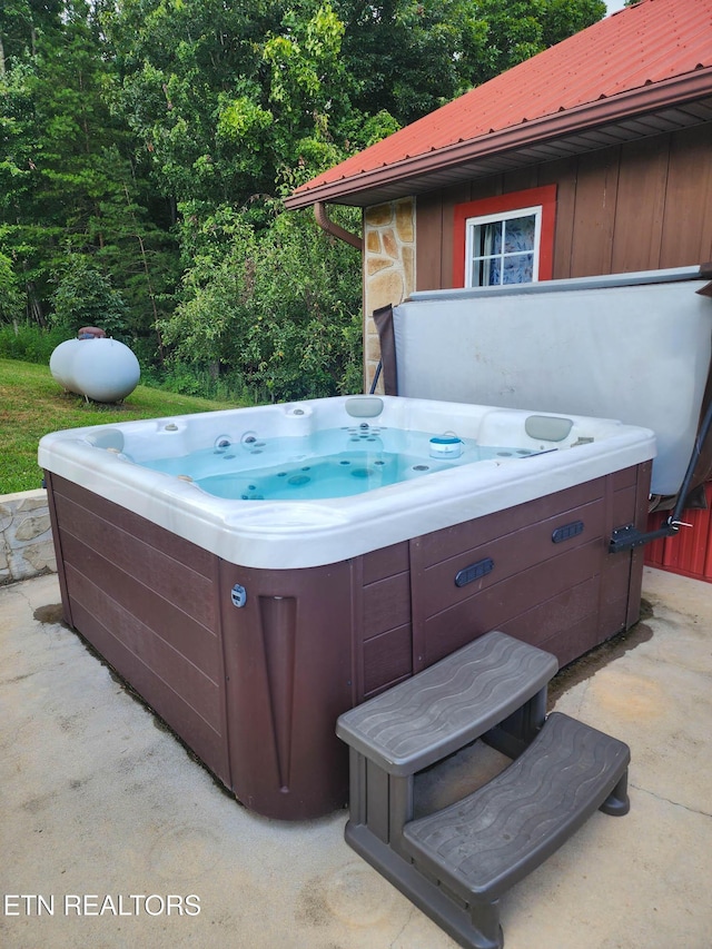 805 Punkton Rd, Del Rio, TN 37727 - view of patio / terrace with a hot tub