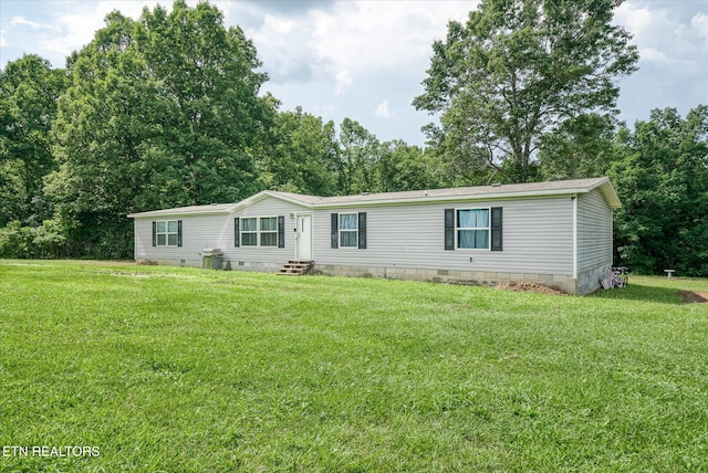 90 Byers Ln, Crossville, TN 38571 - manufactured / mobile home featuring entry steps, crawl space, and a front lawn