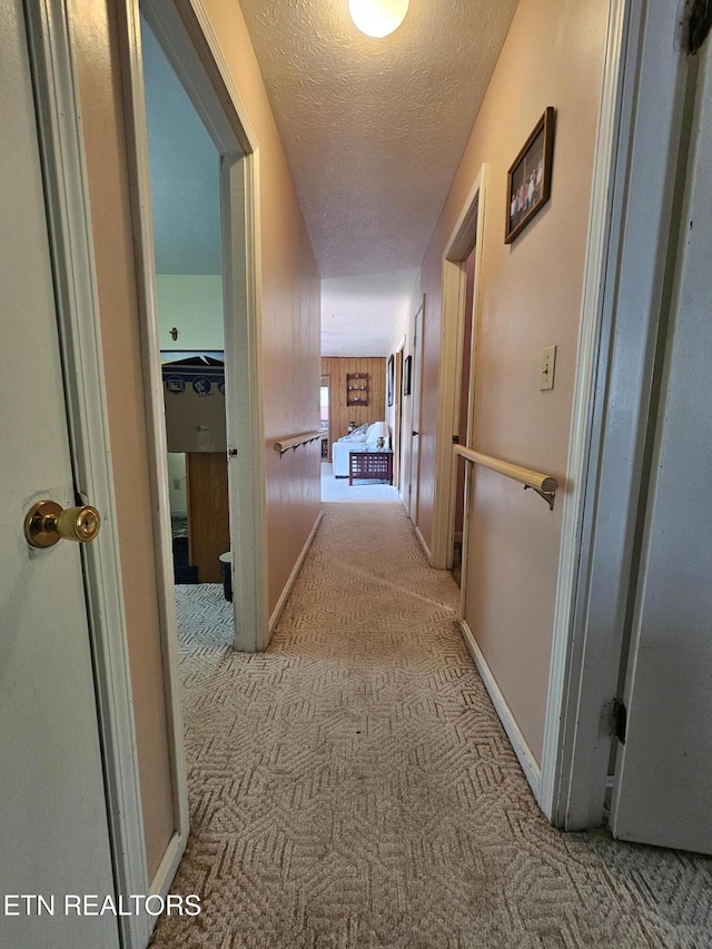 1106 Smyth Chapel Rd, Pennington Gap, VA 24277 - hallway with carpet and a textured ceiling
