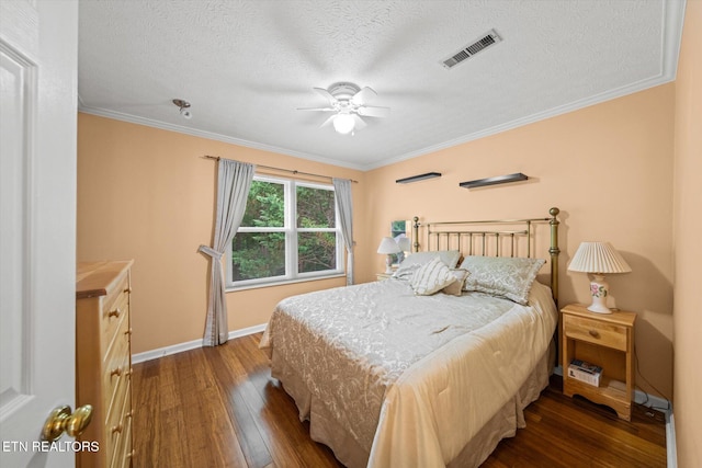 1476 Pheasants Glen Dr, Knoxville, TN 37923 - bedroom featuring hardwood / wood-style flooring, crown molding, a textured ceiling, and a ceiling fan