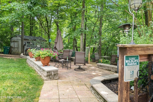 1476 Pheasants Glen Dr, Knoxville, TN 37923 - view of patio featuring a storage shed