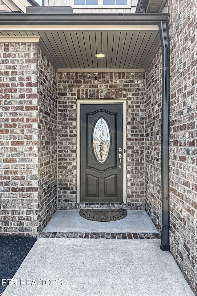 12504 Tangle Crest Ln, Knoxville, TN 37932 - doorway to property featuring brick siding