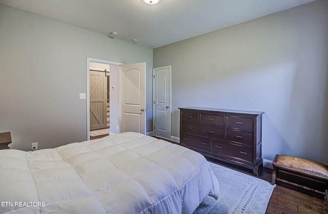 12504 Tangle Crest Ln, Knoxville, TN 37932 - bedroom featuring dark wood-type flooring and baseboards