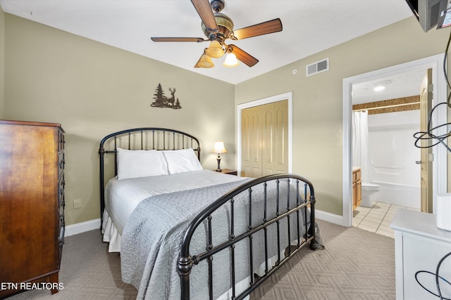 818 Golf View Blvd Unit 1502, Pigeon Forge, TN 37863 - bedroom featuring a closet, carpet floors, ceiling fan, and ensuite bathroom