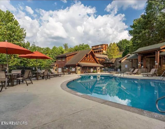 818 Golf View Blvd Unit 1502, Pigeon Forge, TN 37863 - community pool featuring a patio