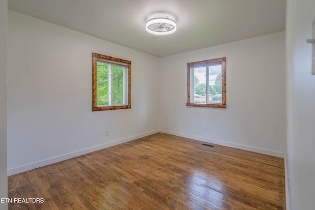 213 Towne Rd, Knoxville, TN 37934 - empty room with baseboards and wood finished floors