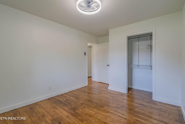 213 Towne Rd, Knoxville, TN 37934 - unfurnished bedroom featuring wood finished floors and a closet