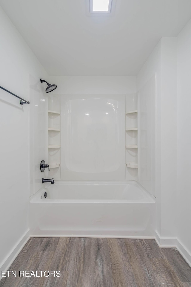 213 Towne Rd, Knoxville, TN 37934 - bathroom featuring wood finished floors and bathing tub / shower combination
