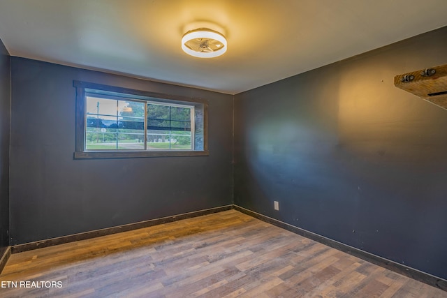 213 Towne Rd, Knoxville, TN 37934 - spare room featuring wood finished floors and baseboards