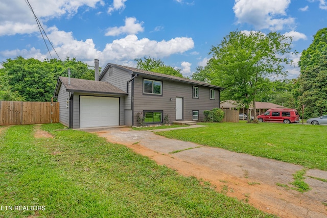 213 Towne Rd, Knoxville, TN 37934 - bi-level home with concrete driveway and a garage